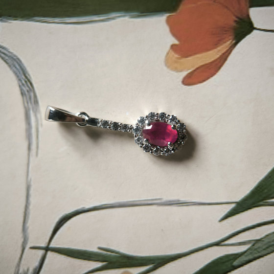Silver pendant with a 1.113-carat ruby and cubic zirconia