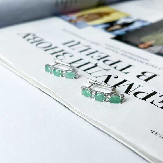 Silver earrings with a 3.136-carat emerald and cubic zirconia
