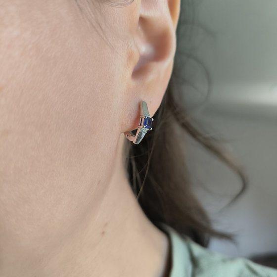 Silver earrings with a 0.889-carat sapphire and cubic zirconia