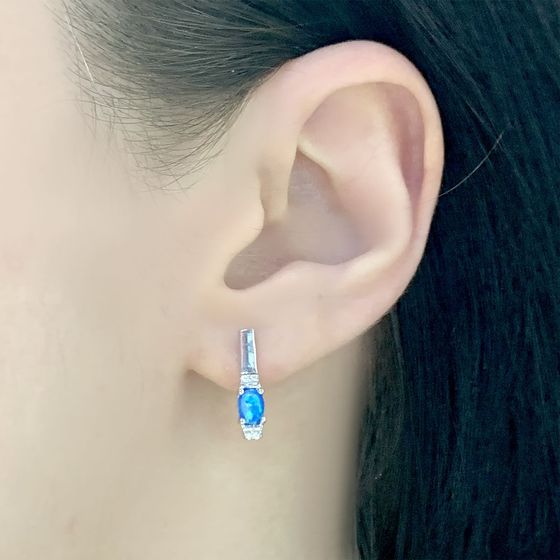 Silver ring with opal