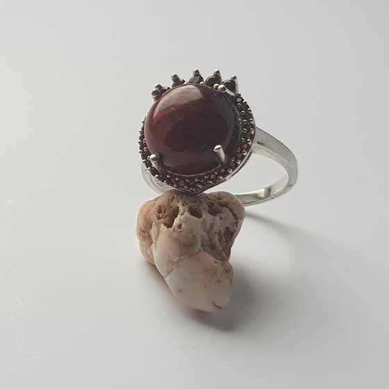 Silver ring with white topaz.