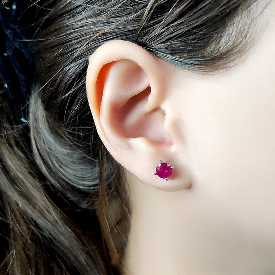Silver earrings with a ruby