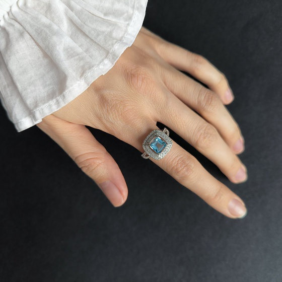 Silver ring with topaz 3.289ct, cubic zirconia