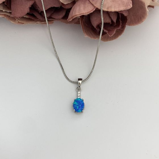 Silver pendant with opal