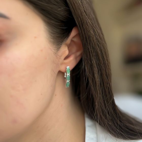 Silver earrings with a 3.136-carat emerald and cubic zirconia