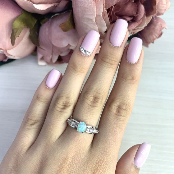 Silver ring with opal