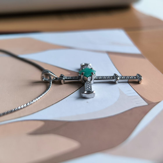 Silver cross with emerald and cubic zirconia