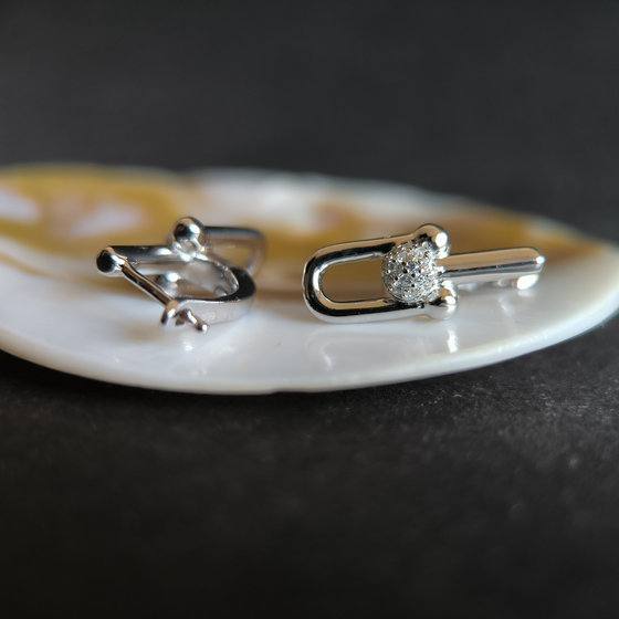 Silver earrings with Phianites