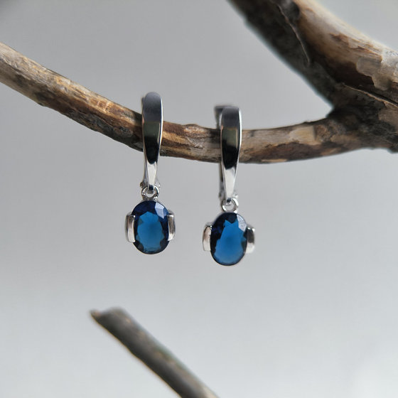 Silver earrings with a 1.825-carat nano sapphire