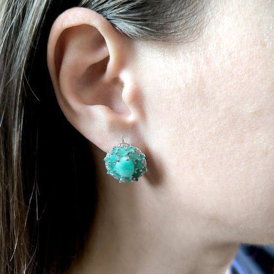 Sterling silver earrings with 7.571ct emerald, pave diamonds