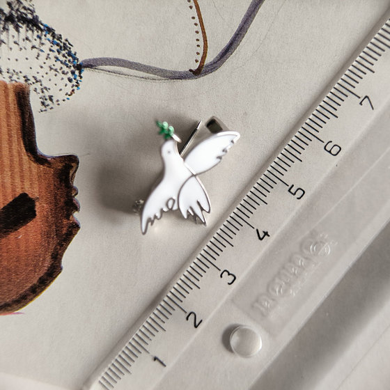Silver brooch with enamel