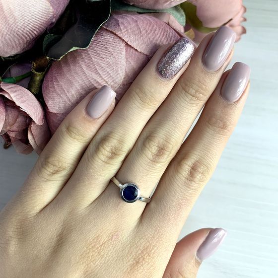 Silver ring with a sapphire