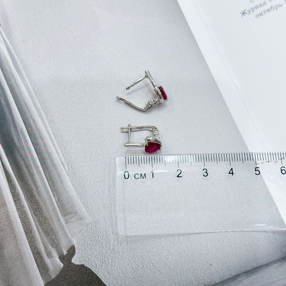 Silver earrings with a 2.118-carat ruby