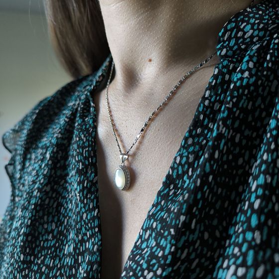Silver pendant with phianites, mother-of-pearl