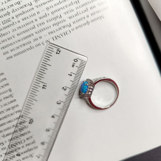 Silver ring with opal, fianites