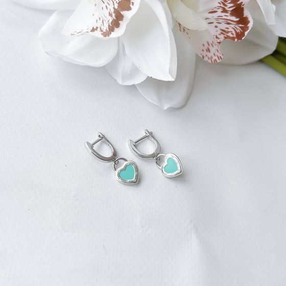 Silver earrings with yemallu