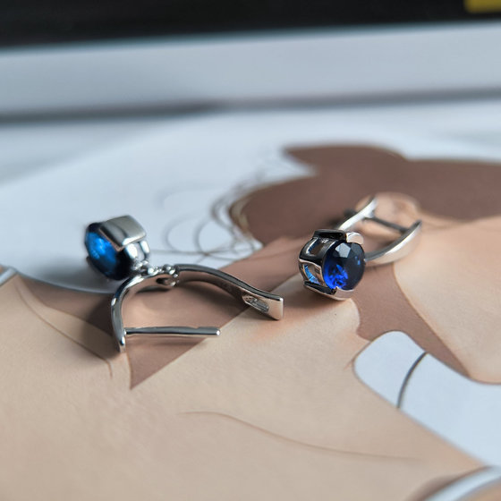 Silver earrings with a 1.825-carat nano sapphire