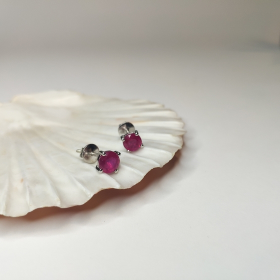 Silver earrings with a ruby