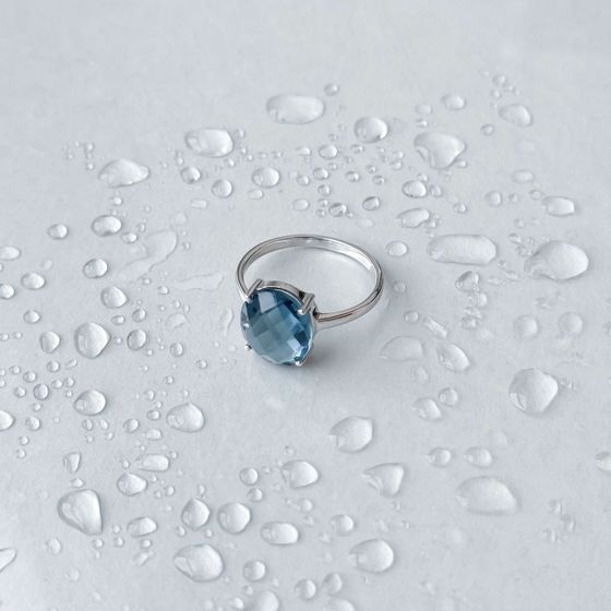 Silver ring with a London Blue topaz