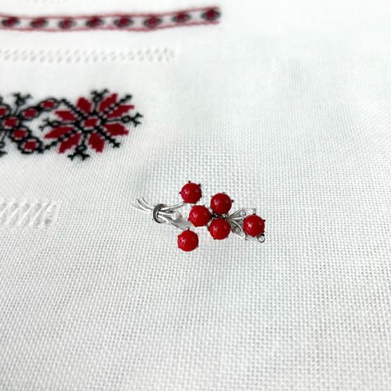 Silver brooch with coral