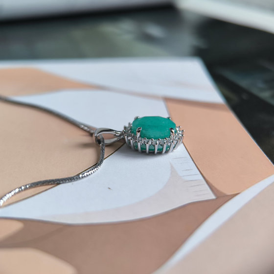 Silver pendant with 2.699ct emerald and cubic zirconia