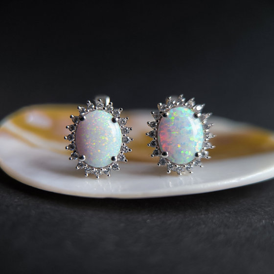 Silver earrings with opal, fianites