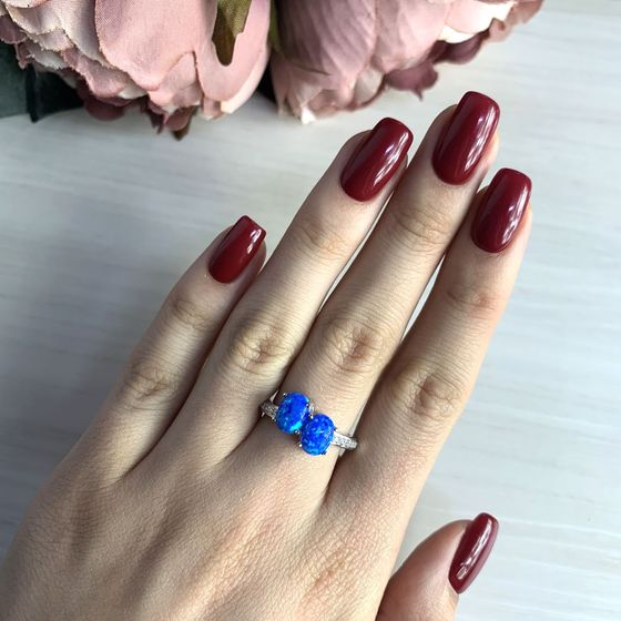 Silver ring with opal