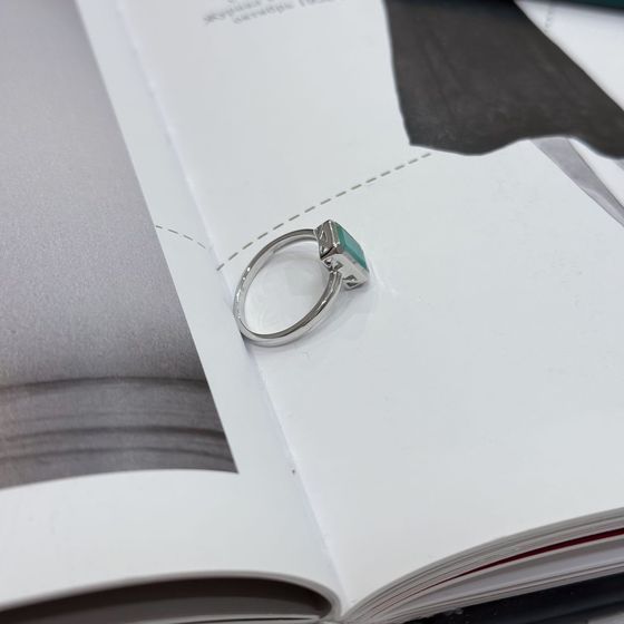 Silver ring with emerald