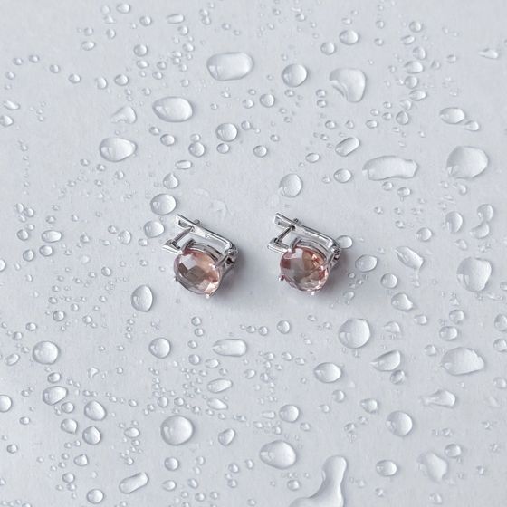 Silver earrings with 5.465 carats of sultanite