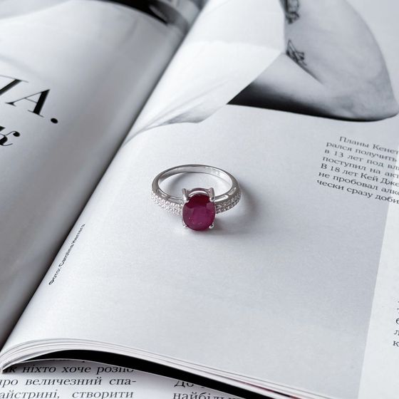 Silver ring with a ruby