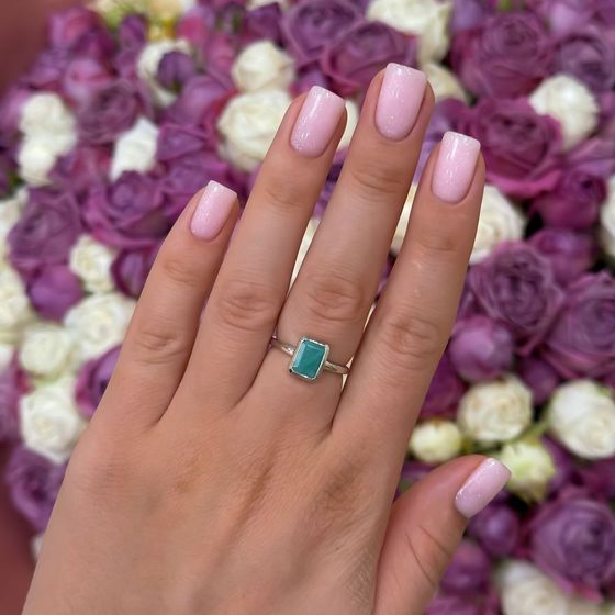 Silver ring with emerald