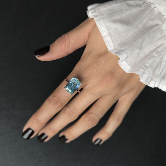Silver ring with topaz