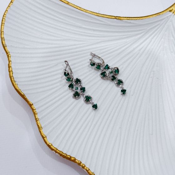 Silver earrings with a 3.452-carat nano emerald