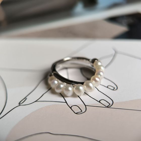 Silver ring with baroque pearls