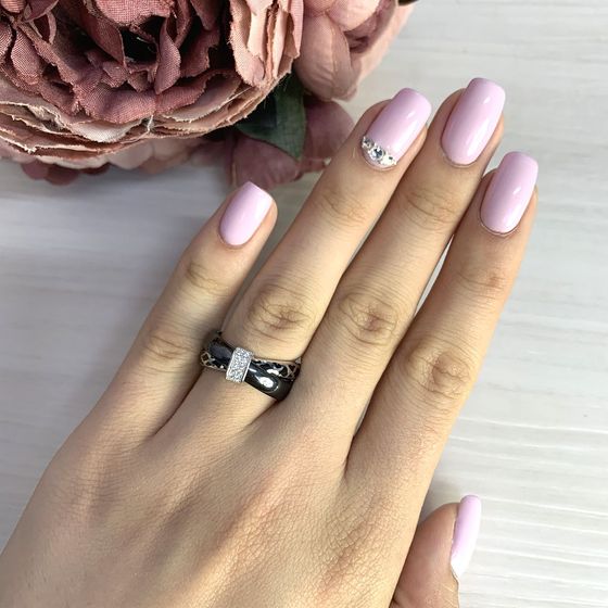 Silver ring with, uh, ceramic.