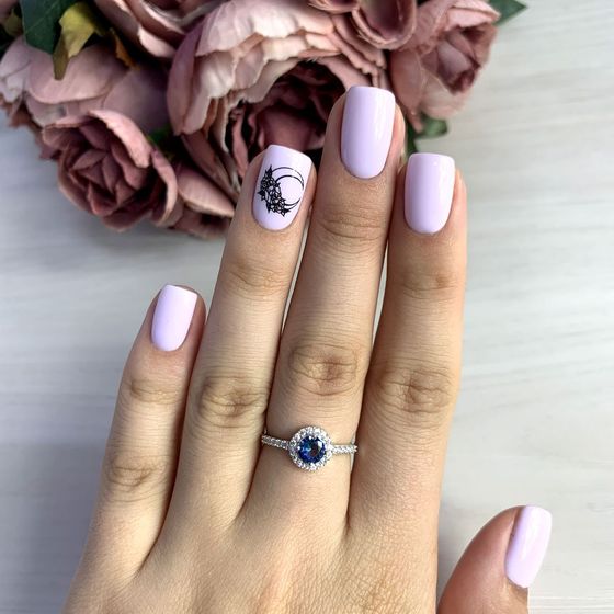 Silver ring with a 0.75-carat mystic topaz