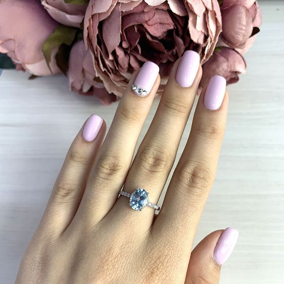 Silver ring with a topaz