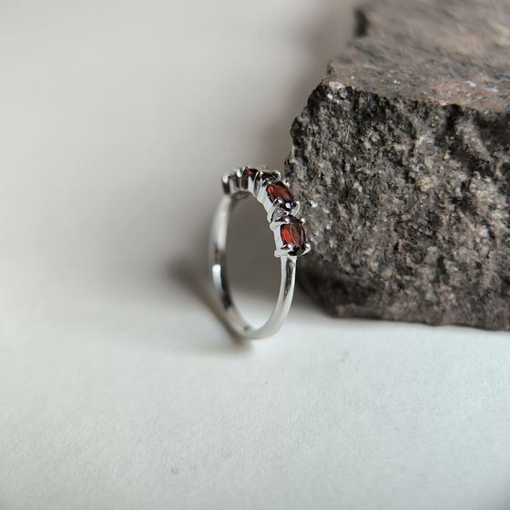 Silver ring with a garnet