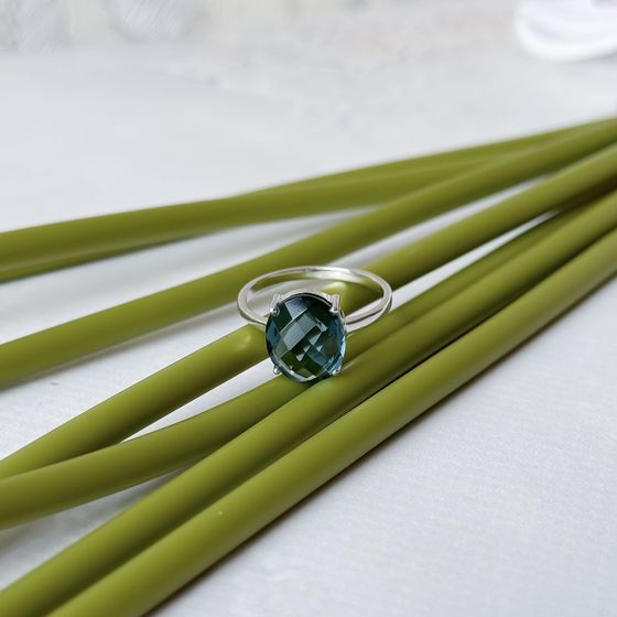 Silver ring with a London Blue topaz