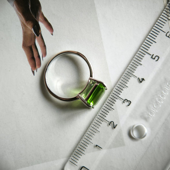 Silver ring with a 4.252-carat chrysolite