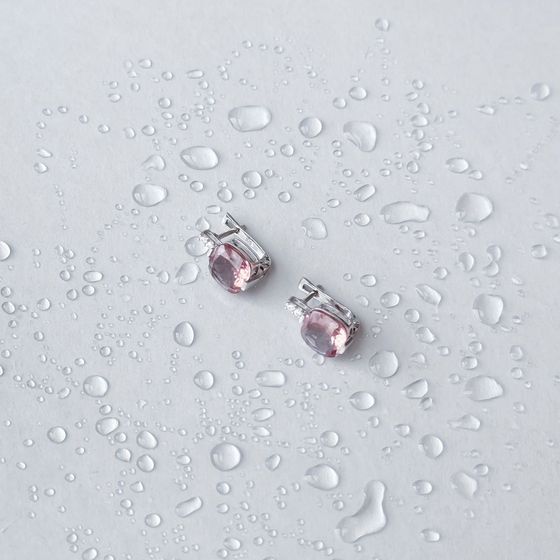 Silver earrings with 5.671 ct of sultanite
