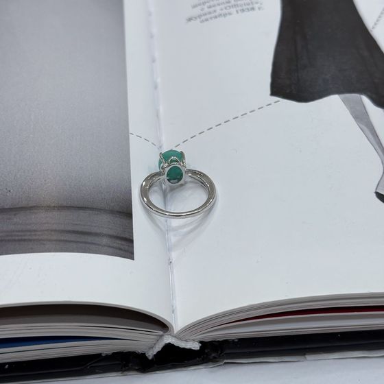 Silver ring with a 2.483-carat emerald and cubic zirconia