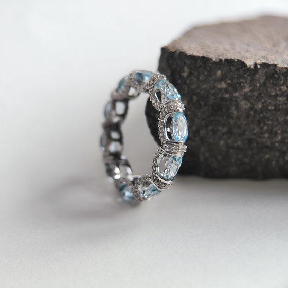 Silver ring with topaz 6.787ct, cubic zirconia