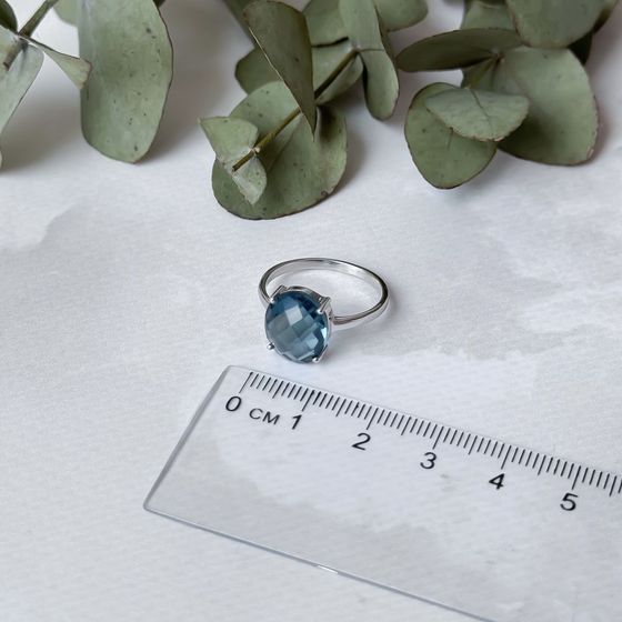 Silver ring with a London Blue topaz