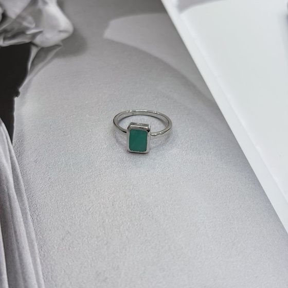 Silver ring with emerald