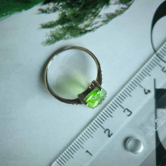 Silver ring with a 3.245-carat chrysolite