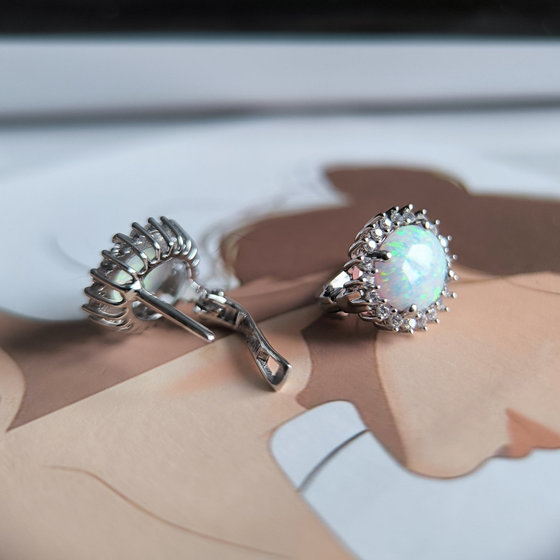 Silver earrings with opal, fianites