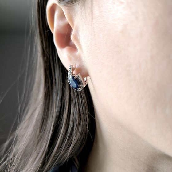 Sterling silver earrings with 7.667ct sapphire, pave diamonds