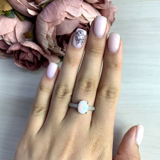 Silver ring with a 1.237-carat opal
