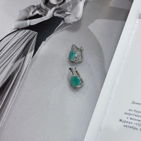 Silver earrings with emerald, fianites